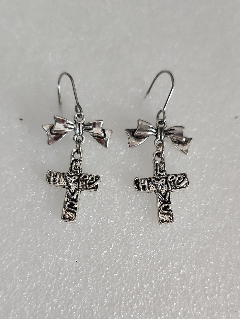 Hand Crafted Silver Bow Cross Dangle Earrings
